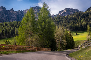 Fototapeta na wymiar Sunny spring day in Dolomites, picturesque Val di Funes.