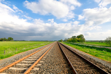 Fototapeta na wymiar railway track in Dutch countryside