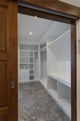 panoramic view of nice modern style walk-in closet 