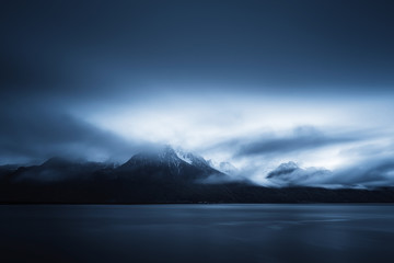 Early moring clouds over mountains and Lake Geneva