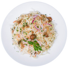 Sauerkraut salad with mushrooms in a white plate
