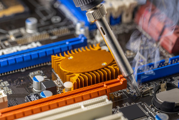 Motherboard fixed with soldering iron
