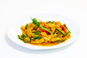 Stir-Fried Squid with Salted Egg Yolk on white dish isolated white background.