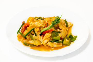 Stir-Fried Squid with Salted Egg Yolk on white dish isolated white background.