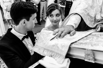 stylish luxury bride and elegant groom, making oaths, emotional wedding ceremony