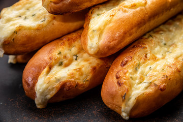Assortment of fresh French baguettes on a wooden table