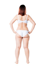 Fat woman in underwear isolated on white background, cellulite on female body