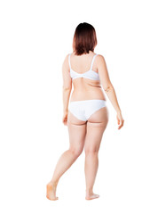 Fat woman in underwear isolated on white background, cellulite on female body