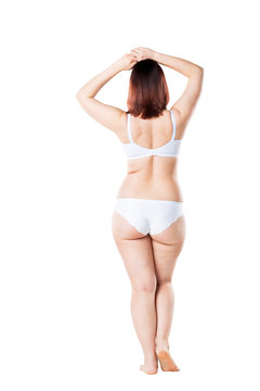 Fat woman in underwear isolated on white background, cellulite on female body