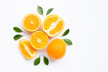 High vitamin C. Fresh orange citrus fruit with leaves isolated on white background.
