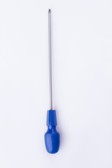 Long screwdriver with blue handle on white background. Hand tool for repair, vertical image.