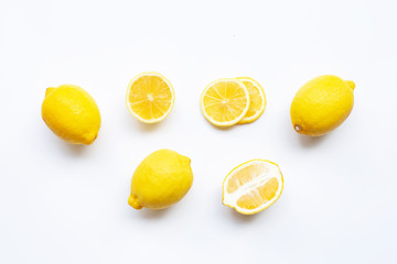 Lemon with slices isolated on white.
