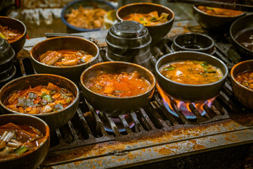 Korean curry dishes cooking in Namdaemun street market in Seoul, Korea