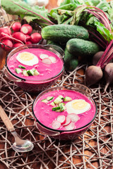 Cold beet soup with egg, cucumber and greens