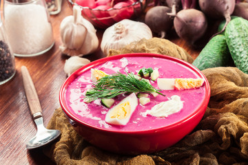 Cold beet soup with egg, cucumber and greens