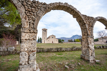 Fototapeta na wymiar arch of abbey of San Vincenzo al Volturno, historic Benedictine abbey. Castel San Vincenzo, Rocchetta a Volturno, Isernia, Volturno Valley, Molise, Italy