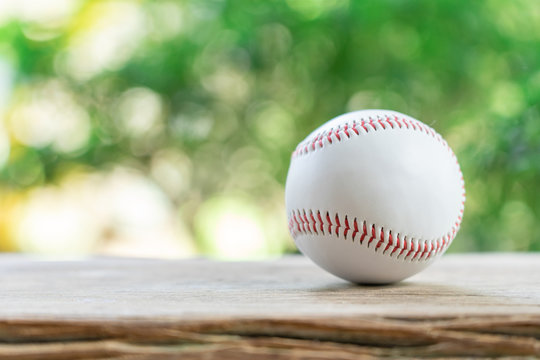 baseball on Abstract background and red stitching baseball. White baseball with red thread.Baseball is a national sport of Japan. It is popular.
