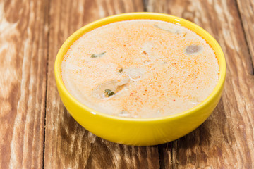 Beautiful yellow soup dishes with fresh vegetables. Buffet of Assorted of Chinese Food Dishes