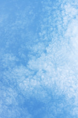 Beautiful light blue sky with white clouds