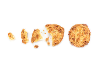 peanut cookie broken on white background.