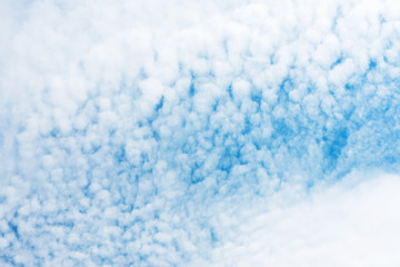 Beautiful light blue sky with white clouds