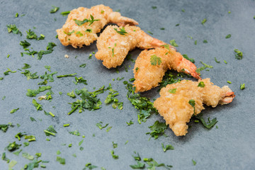 Buffet of Assorted of Chinese Food Dishes. Delicious prawns fried in oil.