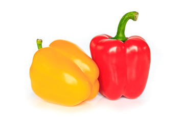 red and yellow bell pepper on white background.
