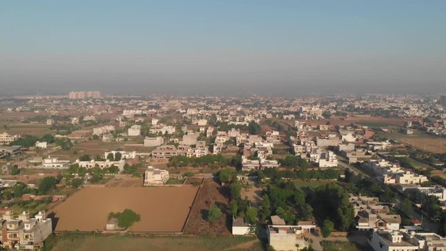 An aerial over the Basant Avenue Morning in summers, An Urban City located in Ludhiana Punjab India, skyline rooftop .