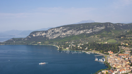 Scenic mountain views of the mountains, city and lake Garda