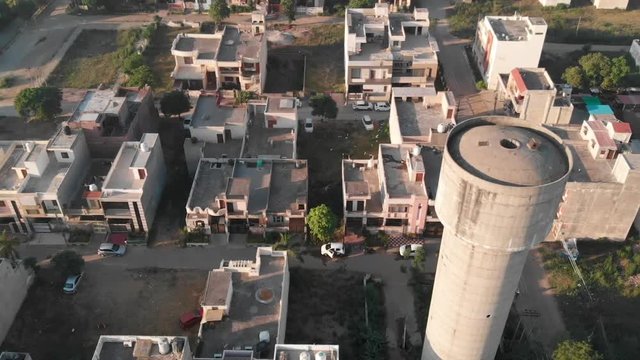 An aerial over the Basant Avenue, An Urban City located in Ludiana Punjab India, skyline including rooftop water tower.