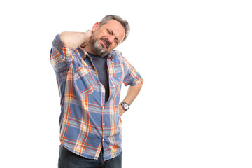 Man touching painful back of neck