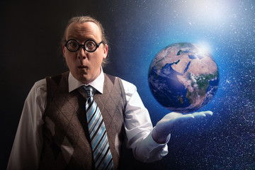 Funny scientist looking to universe and planet earth