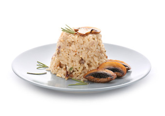 Plate with tasty risotto on white background