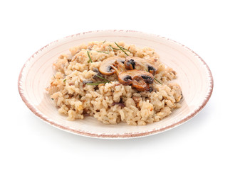 Plate with tasty risotto on white background