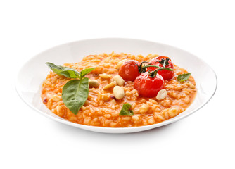 Plate with tasty risotto on white background