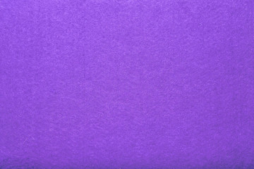 Violet purple felt texture abstract art background. Colored fabric fibers surface. Empty space.