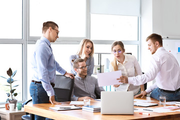 Group of young people at business meeting in office