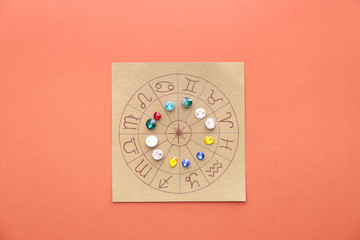 Astrological horoscope with birthstones on color background