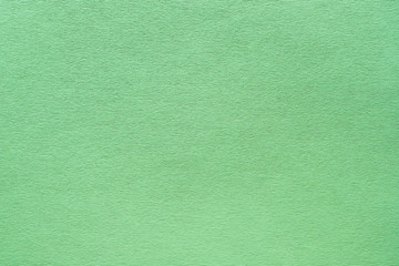 Mint green felt texture abstract art background. Corduroy textile pattern surface. Copy space.