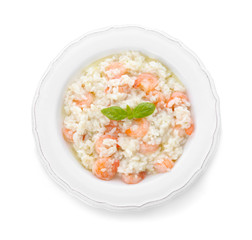 Plate with tasty risotto on white background