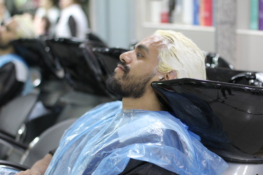 Man Dying His Hair At A Salon 