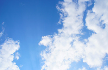 Blue sky with white clouds.
