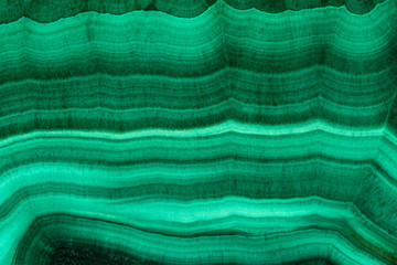 The green malachite. An ornamental stone. Photo texture. Macro. - obrazy, fototapety, plakaty