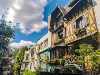 Fototapeta na wymiar Picturesque small street of Villa Montsouris in Paris, France