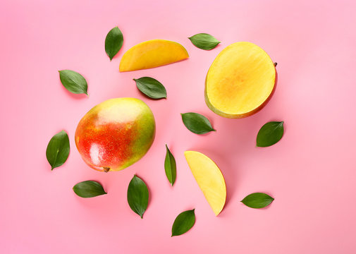 Tasty Fresh Mango On Color Background