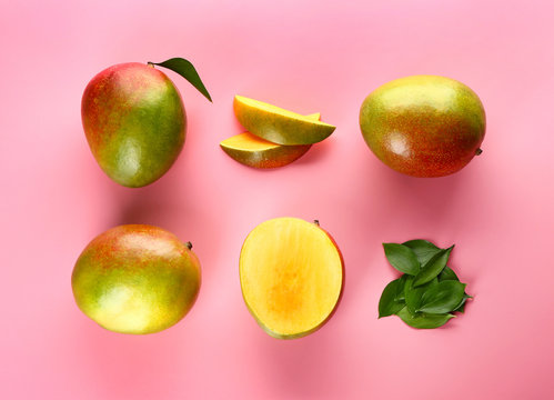 Tasty Fresh Mango On Color Background