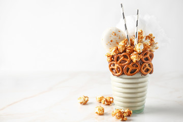 Delicious freak shake on light background