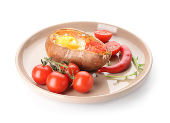 Baked sweet potato with egg and tomato on white background