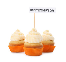 Tasty cupcakes for Father's Day on white background