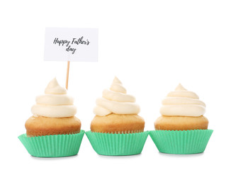 Tasty cupcakes for Father's Day on white background